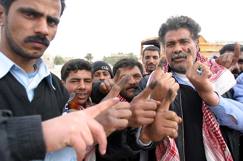 1024px-Iraqi_voters_inked_fingers