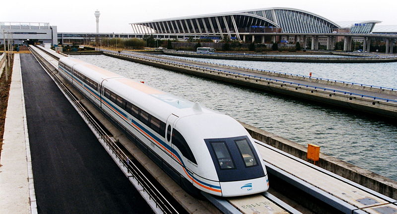 A high-speed Maglev train speeds out of Pudong airport: the kind of infrastructure Asia might expect, Alex Needham via Wikimedia Commons